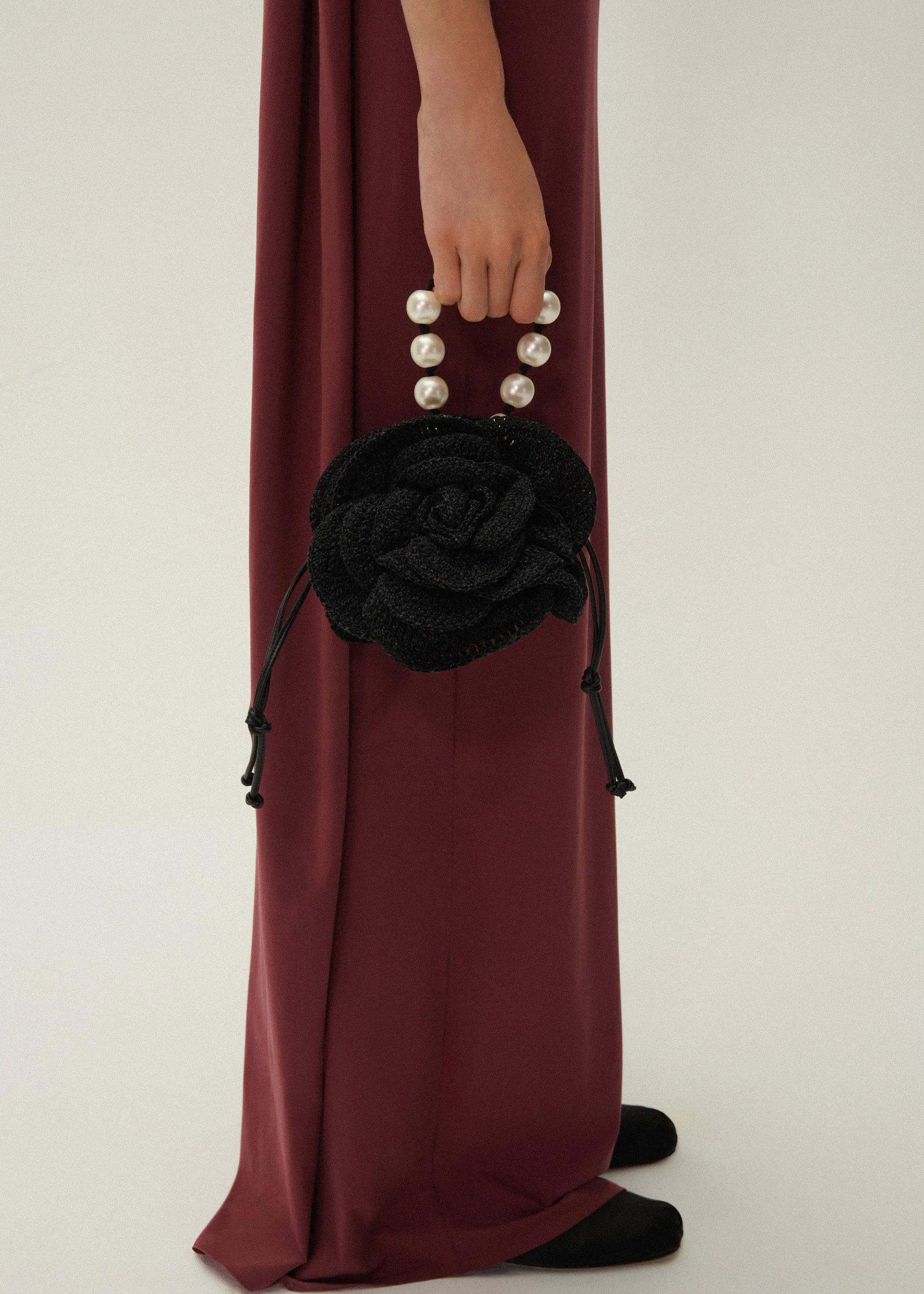 Magda bag pearl strap in black crochet